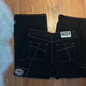 Ragged black jeans got in Paris with white stitching!